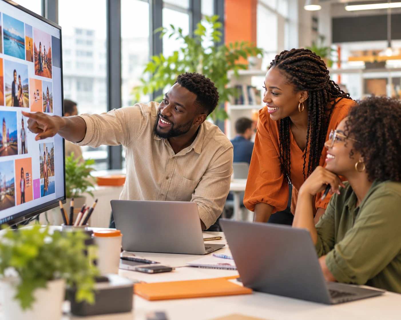 A marketing team reviewing campaign visuals